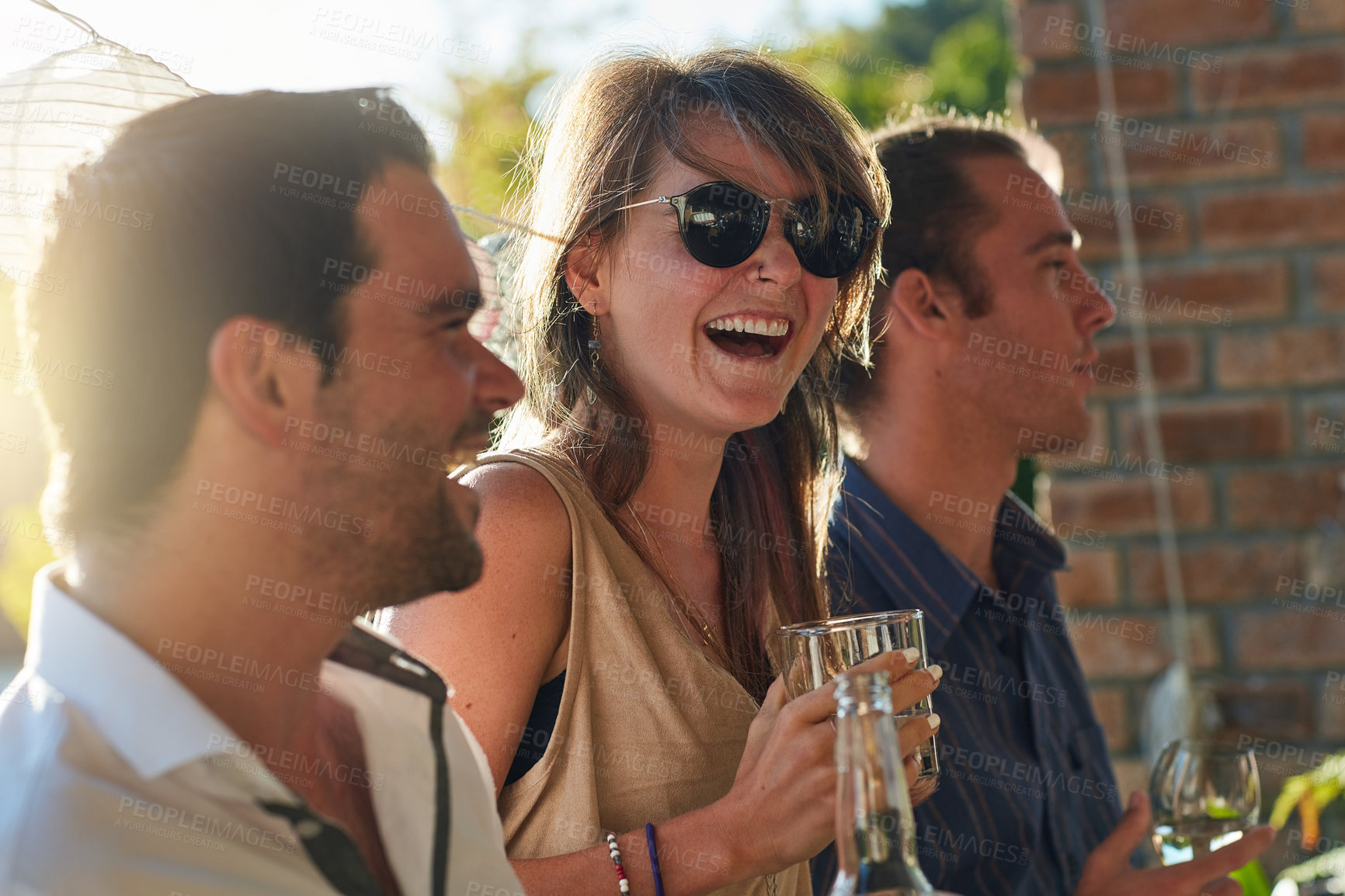 Buy stock photo Friends, drink and excited in backyard, party and happy with bottle, summer and celebration. People, men and woman with sunglasses, wine and social group at event with smile on holiday in Florida