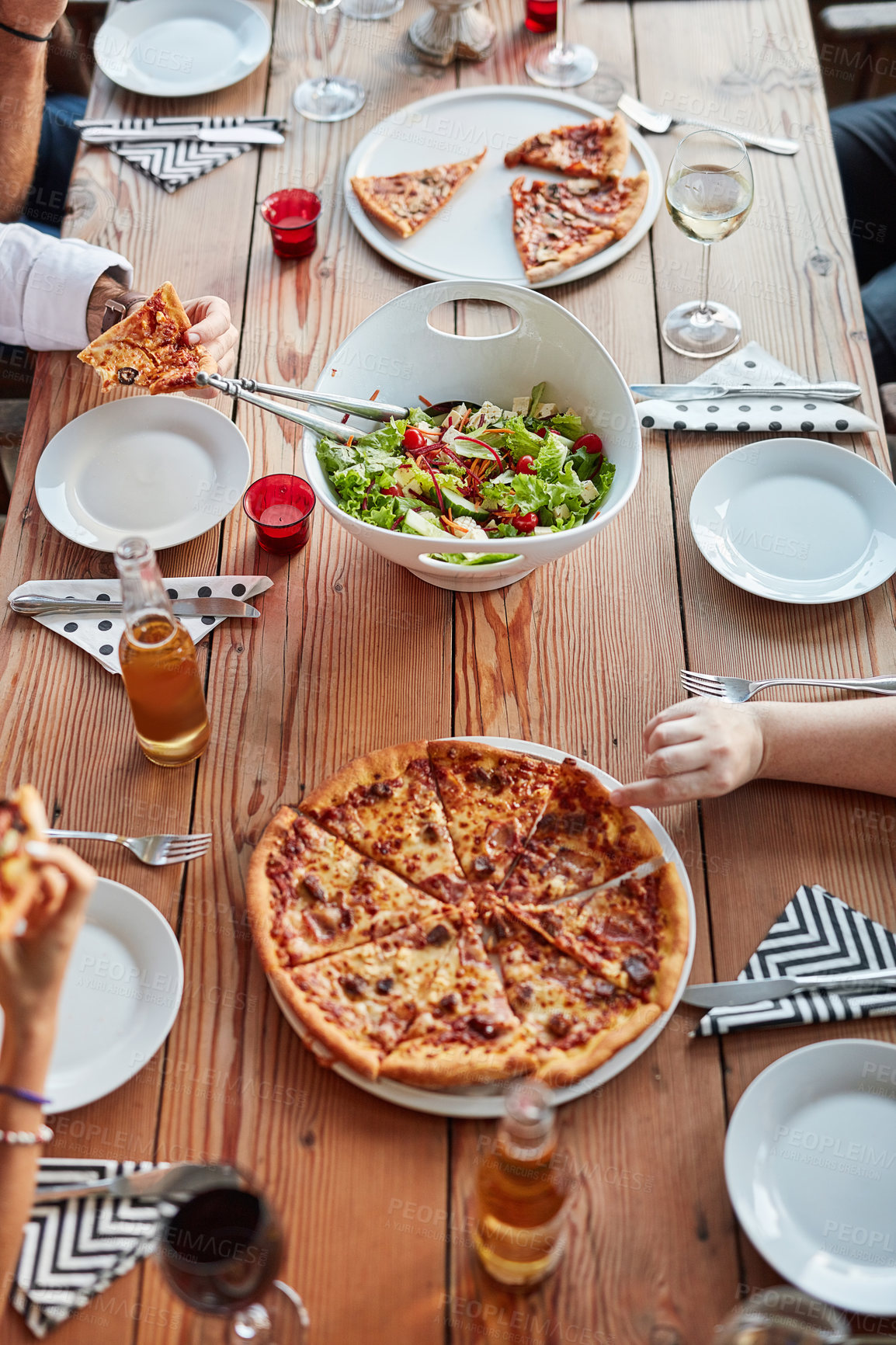 Buy stock photo Friends, pizza and top view of restaurant table for brunch, birthday and celebration as outdoor event. Group of people, food and beer or wine at city pub for lunch, party and social reunion in Italy