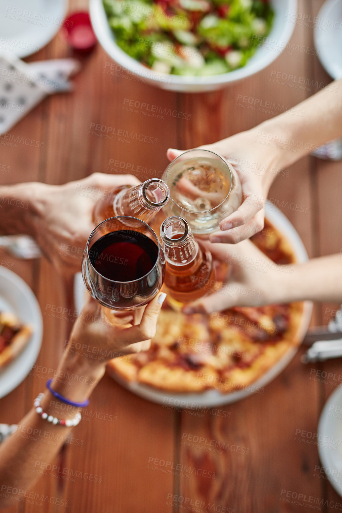 Buy stock photo Hands, drinks and cheers at restaurant for brunch, birthday and celebration as outdoor event with pizza. Friends, people and beer or food in top view for lunch, party and social reunion in Italy