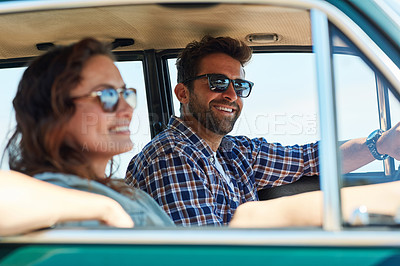 Buy stock photo Cropped shot of an affectionate couple enjoying a summer road trip