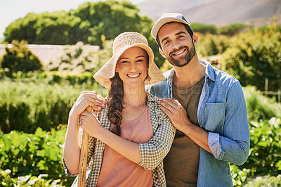 Buy stock photo Portrait of two happy young farmers posing together  in the fields on their farm