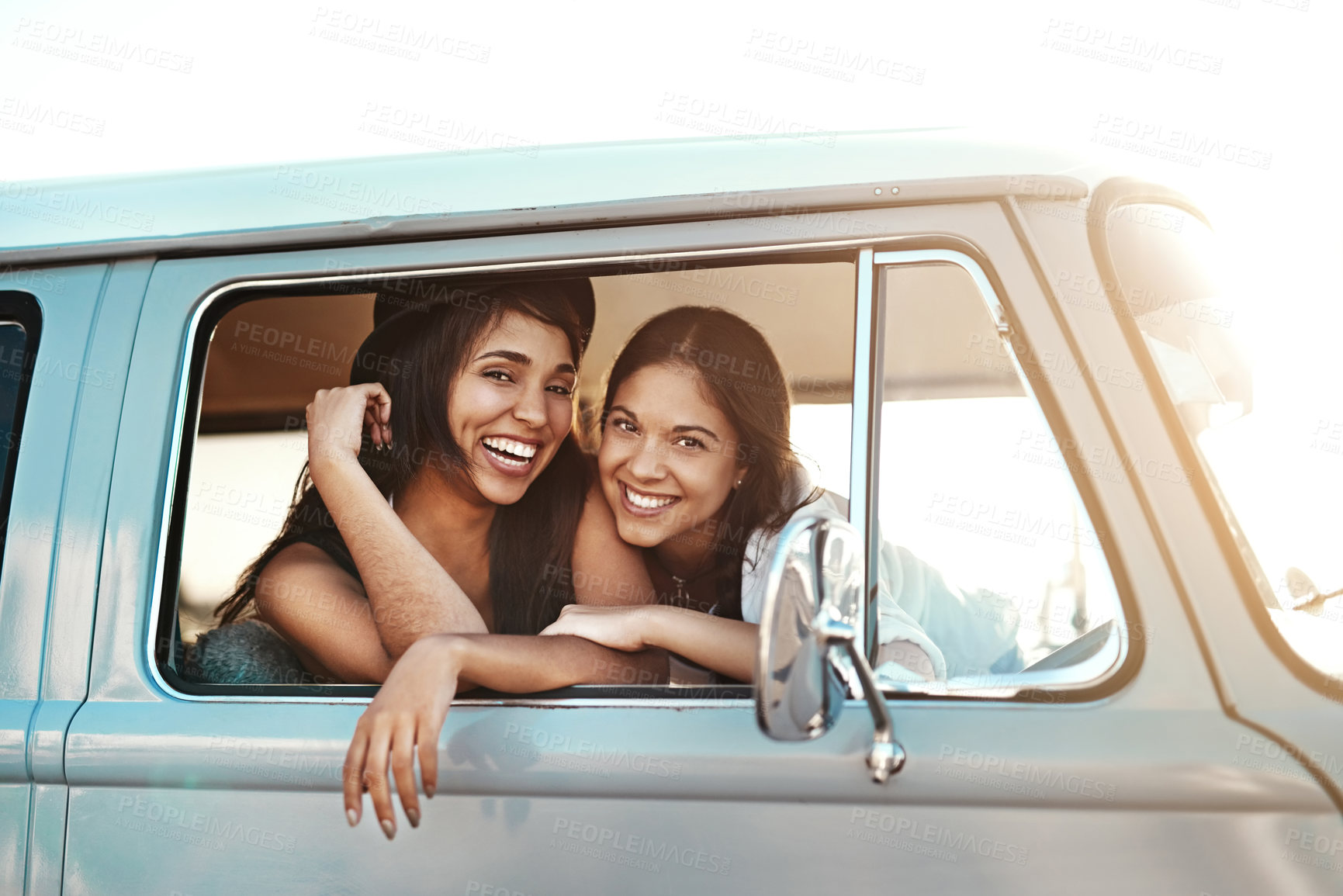 Buy stock photo Women, friends and road trip by window, van and smile for portrait, excited and adventure on holiday. People, travel and transportation for drive with vehicle, happy or highway for vacation in Mexico