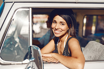 Buy stock photo Portrait of a happy young woman enjoying a road trip with her friend
