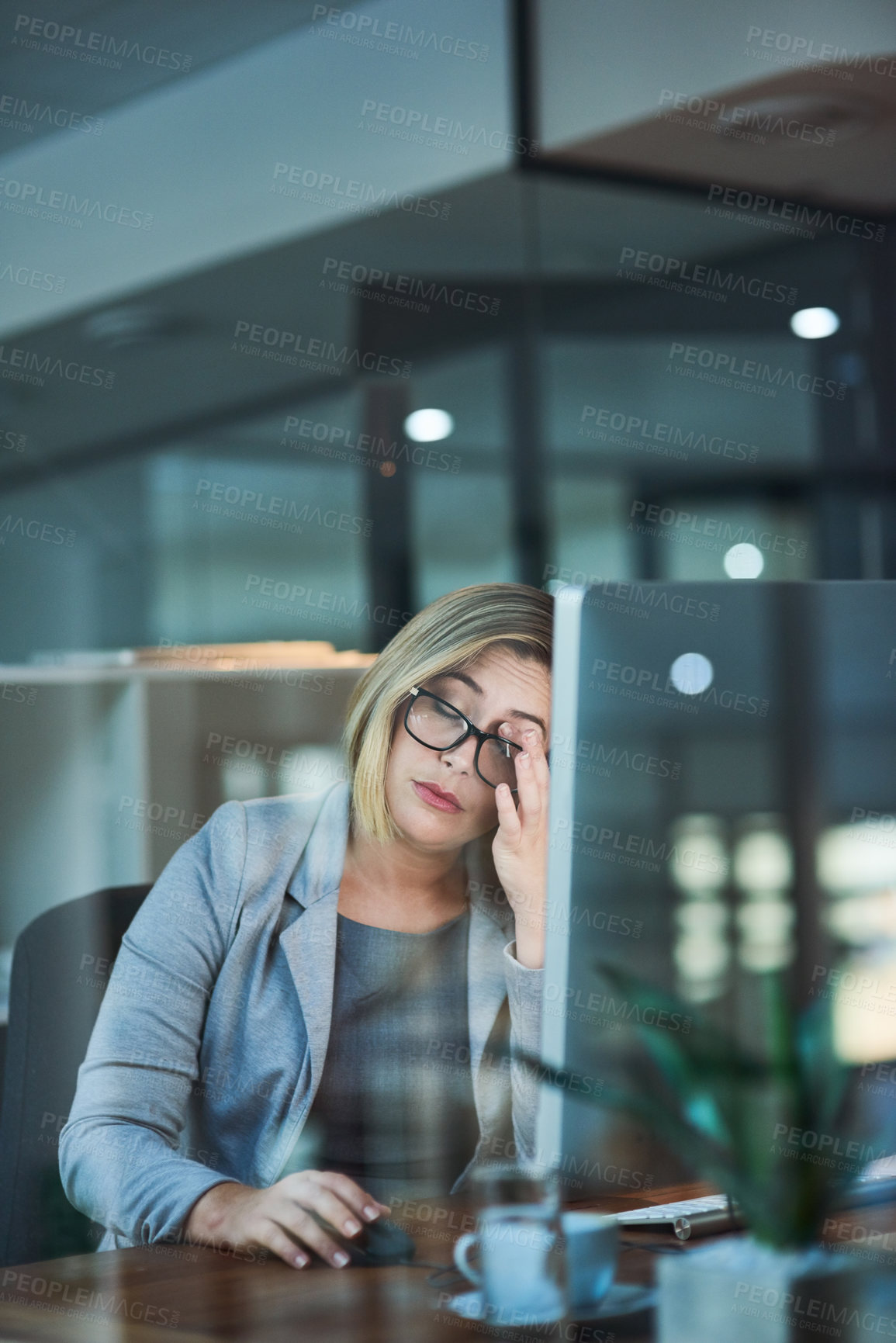 Buy stock photo Tired woman, headache and night with computer in stress, anxiety or burnout at office. Frustrated female person or business employee working late with migraine, strain or depression at workplace