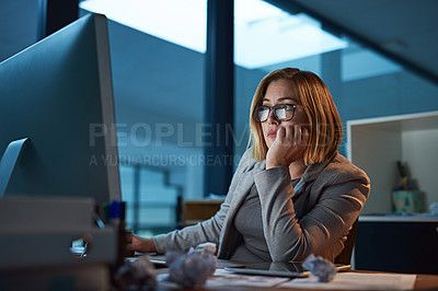 Buy stock photo Cropped shot of a businesswoman working late at night in her office