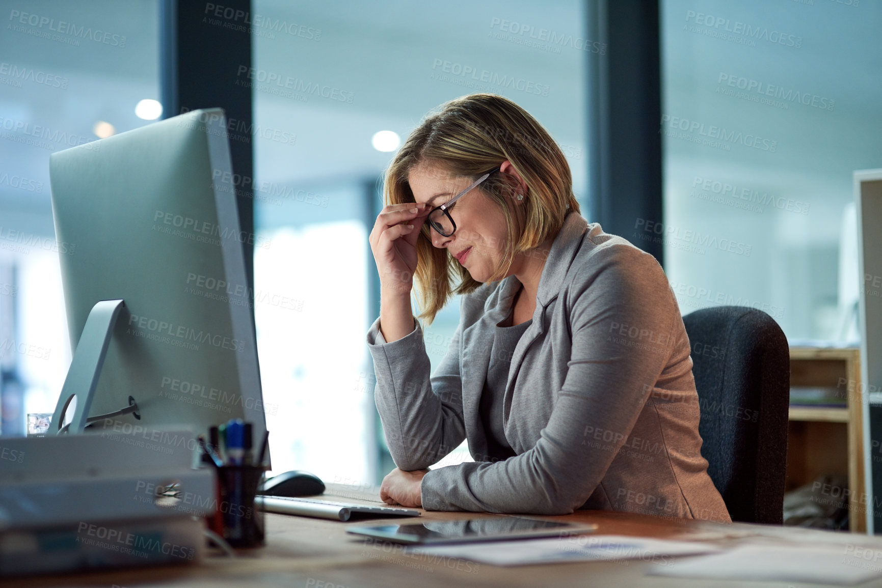 Buy stock photo Headache, stress and business woman in office, tired or fatigue while working late at night on computer. Burnout, deadline and female worker with depression, anxiety or brain fog, sick or exhausted.