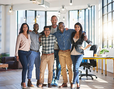 Buy stock photo Portrait of a confident group of creative colleagues posing together in their office