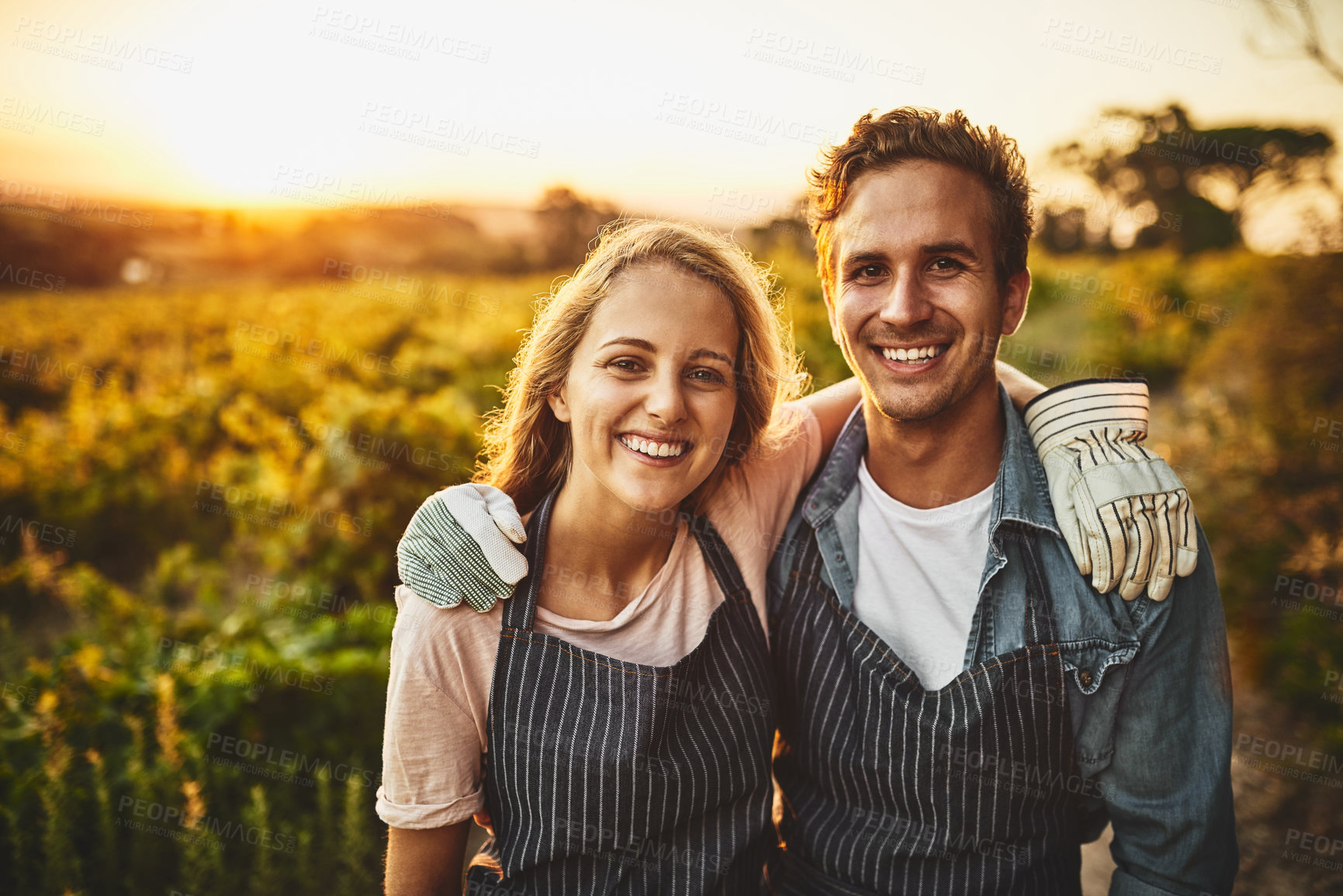 Buy stock photo Portrait of a happy young man and woman working together on a farm