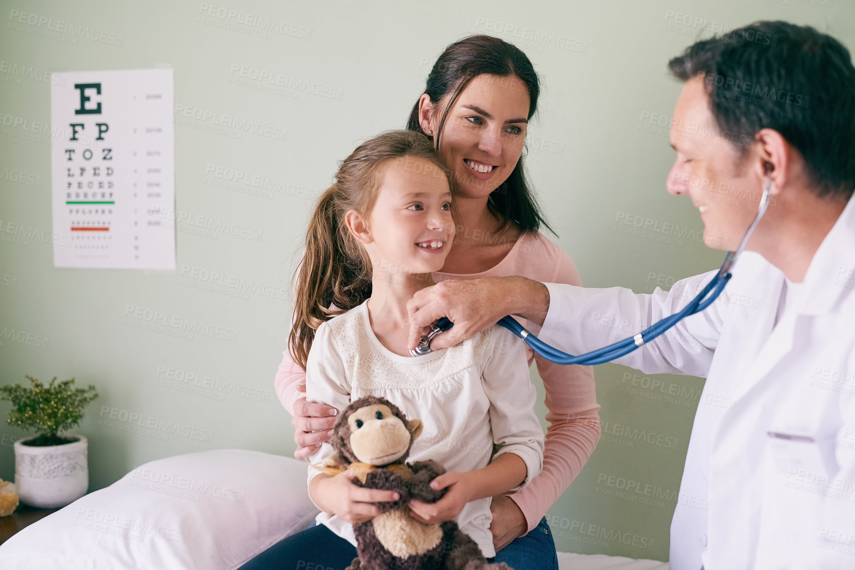 Buy stock photo Stethoscope, healthcare and doctor with mother and child for consultation on chest infection with flu. Teddy bear, medical help and pediatrician with mom and girl kid patient for checkup at clinic.