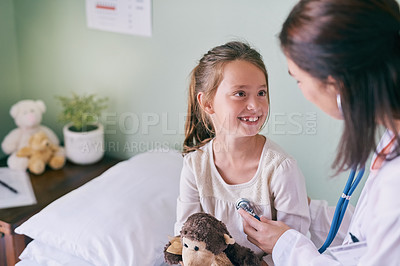 Buy stock photo Medical, children and a girl at the pediatrician for an appointment or checkup in the hospital. Healthcare, stethoscope and cardiology with an adorable female child sitting on a bed in the clinic