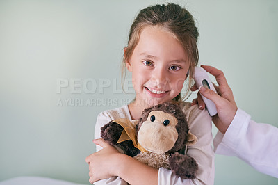 Buy stock photo Healthcare, portrait and a girl at the pediatrician for an ear checkup or appointment in the hospital. Medical, temperature or thermometer with a happy and adorable female child at the health clinic