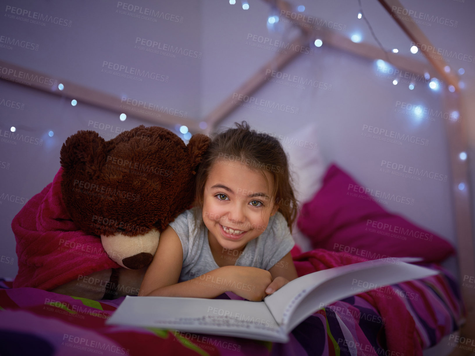 Buy stock photo Portrait, happy kid and reading book in home bedroom for learning, development and knowledge. Face, girl and child studying fantasy story, information and education for hobby with teddy bear to relax