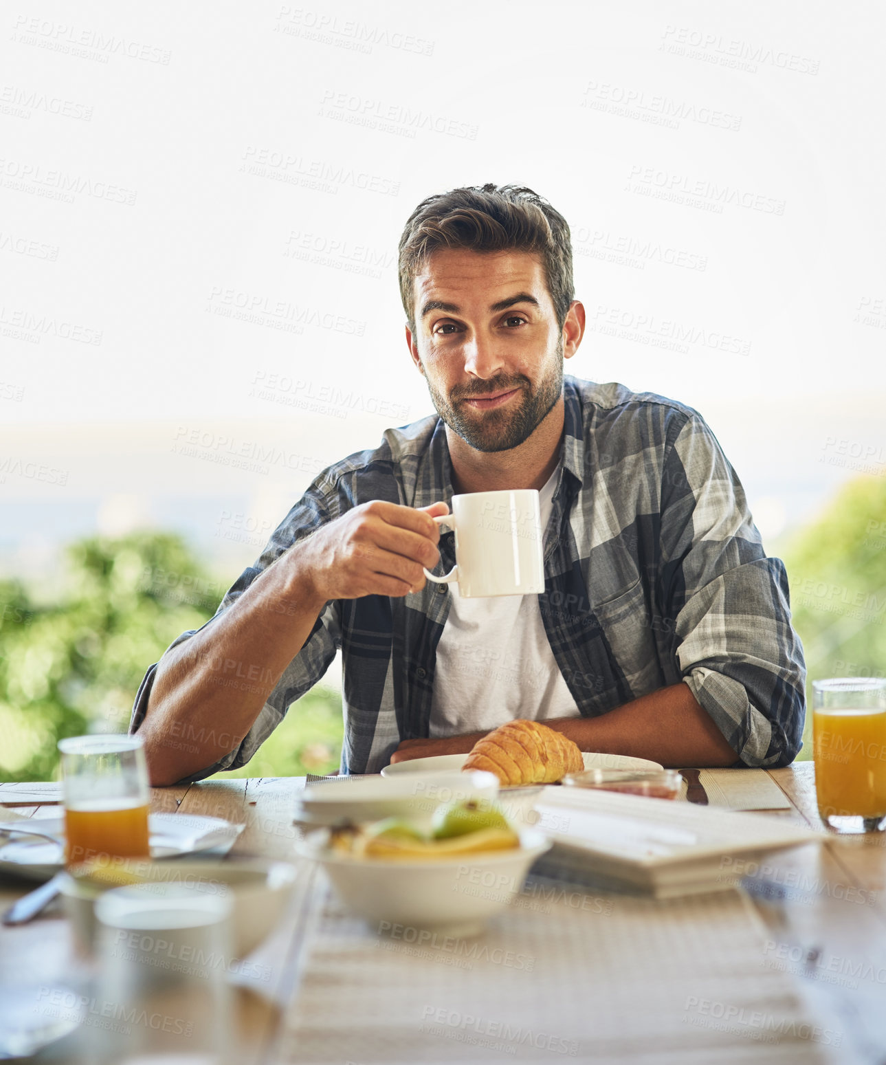 Buy stock photo Breakfast, patio and portrait of man with coffee outdoor for wellness, diet and gut health balance. Travel, hotel or hungry person in backyard with food, nutrition and croissant, fruit or brunch meal