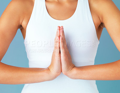 Buy stock photo Hands, woman and meditation with prayer and yoga, spiritual and healing with fitness isolated on blue background. Peace, zen and mindfulness, female yogi meditate in studio with closeup and namaste