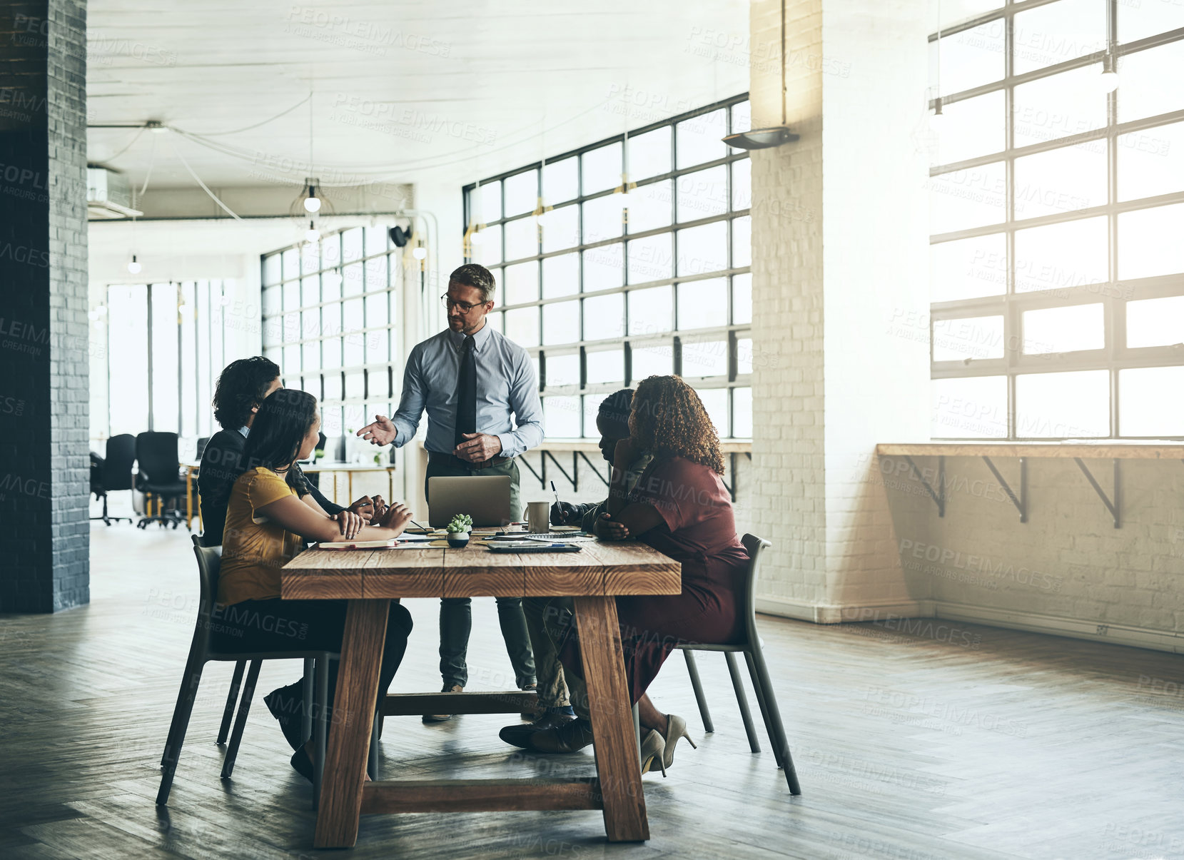 Buy stock photo Laptop, leadership or businessman in presentation for teaching, problem solving or solution in meeting. Manager, workshop or mentor talking in team training, coaching class or learning opportunity