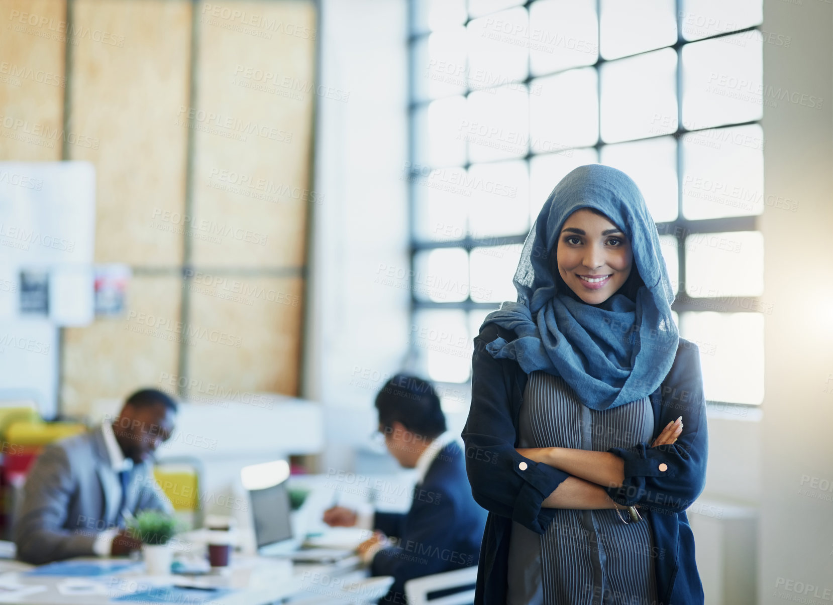 Buy stock photo Muslim woman, business and portrait in an office with a smile and arms crossed for career pride. Arab female entrepreneur or leader at a diversity and corporate workplace with a positive mindset 