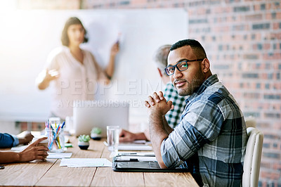 Buy stock photo Portrait of a businessman sitting in a meeting in the boardroom