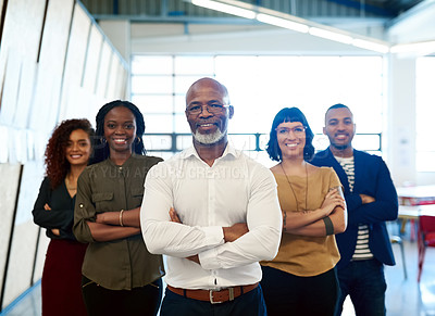 Buy stock photo Portrait of a group of designers posing together in their office