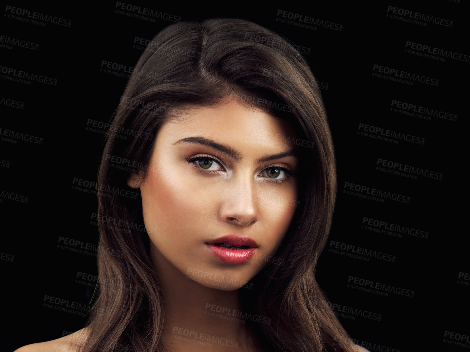 Buy stock photo Studio close up shot of a beautiful woman posing against a black background