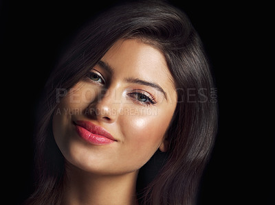 Buy stock photo Studio close up shot of a beautiful woman smiling and posing against a black background