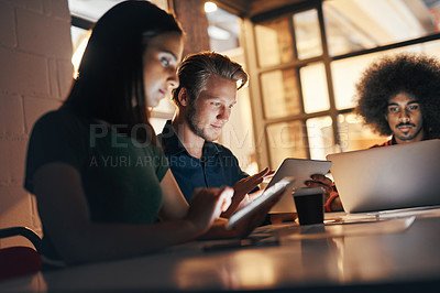 Buy stock photo Shot of a group of designers having a brainstorming session in the boardroom