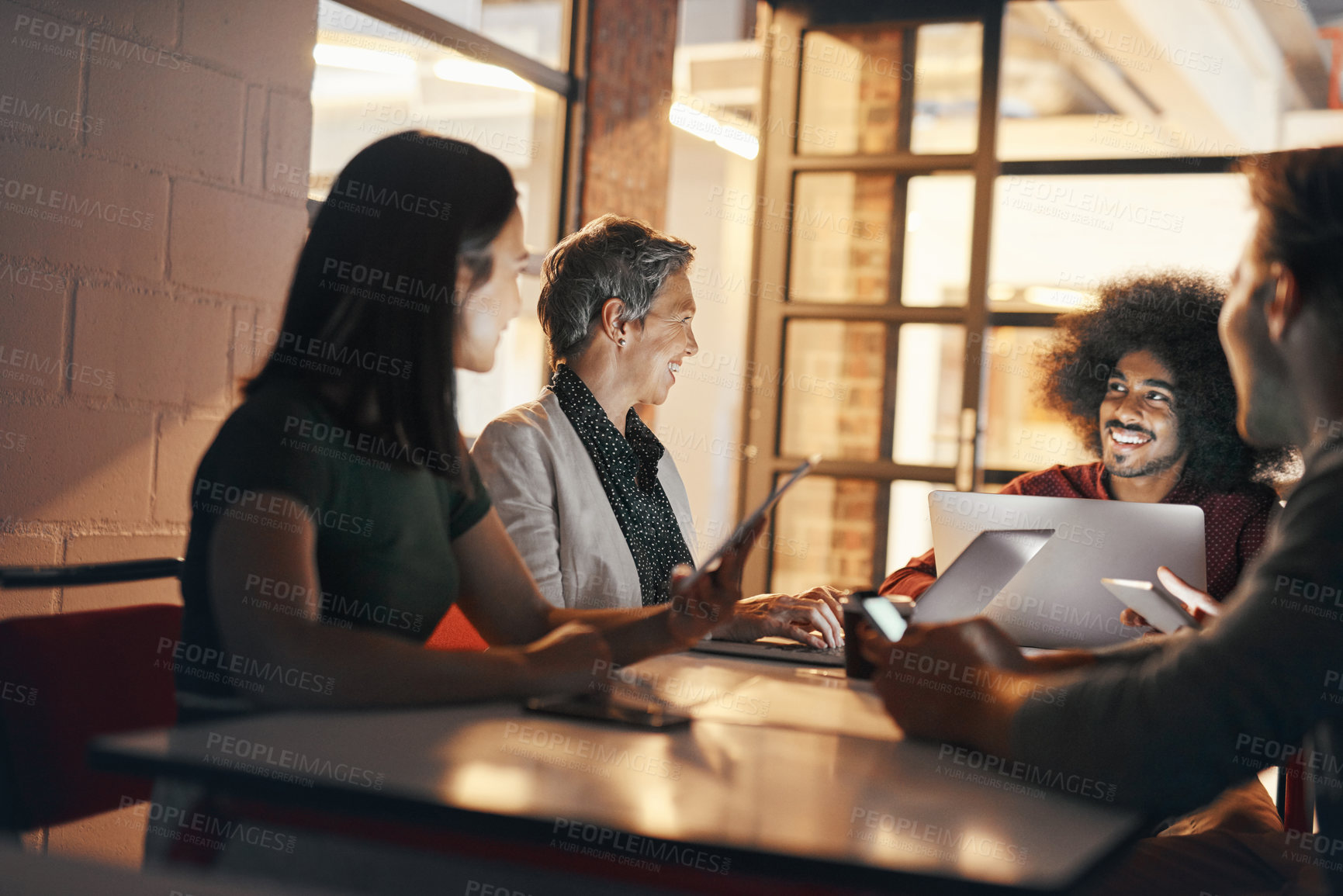 Buy stock photo Shot of a group of designers having a brainstorming session in the boardroom