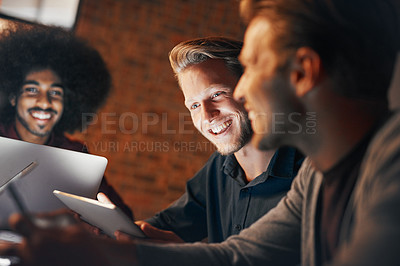 Buy stock photo Shot of a group of designers having a brainstorming session in the boardroom