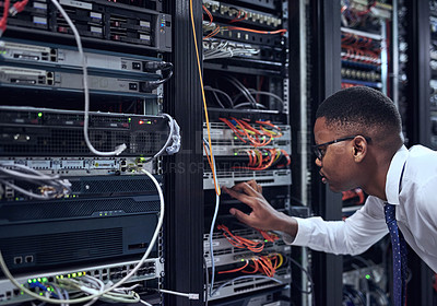 Buy stock photo Black man, IT technician and server room for cyber security, data or network storage inspection. African male person or networking administrator checking system, cables or installation at datacenter