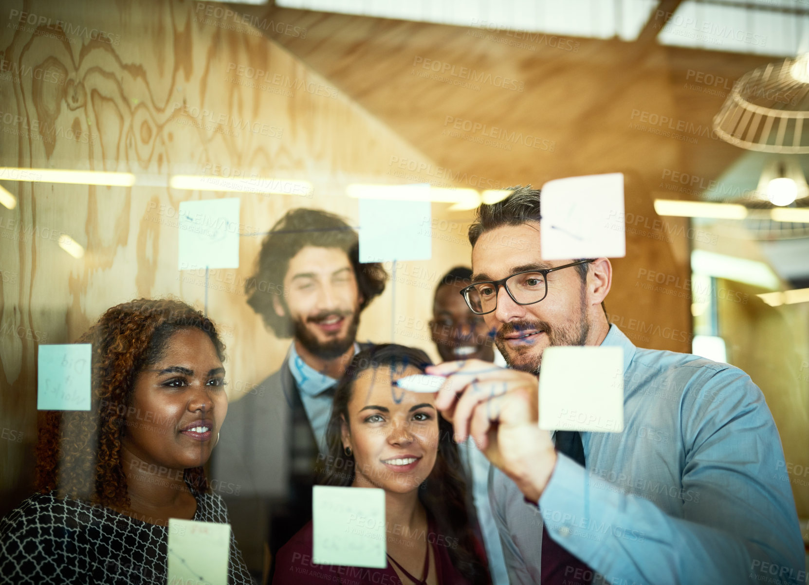 Buy stock photo Writing, strategy and business people with glass board for brainstorming, ideas or sticky note in office. Engineers, diversity and employees in meeting for planning, equation or structural analysis