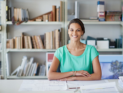 Buy stock photo Cropped portrait of an attractive young female architect sitting in her office