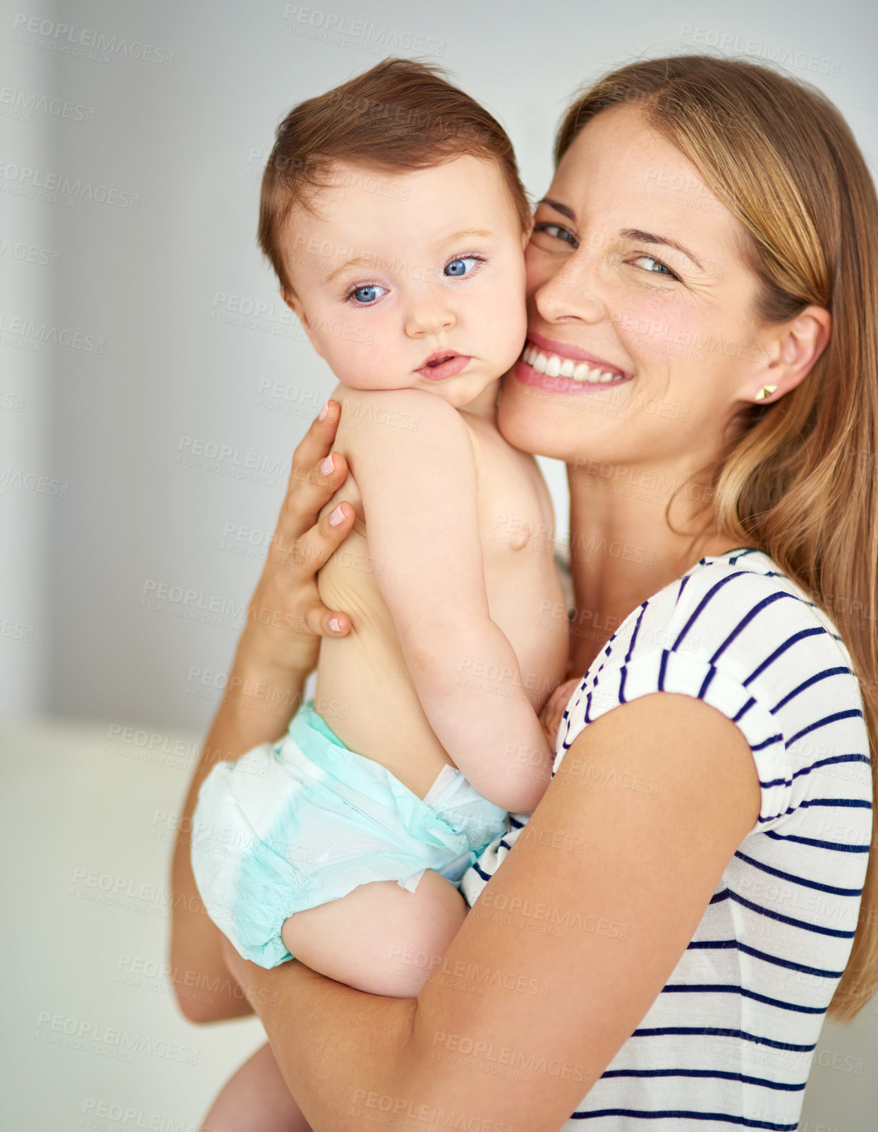 Buy stock photo Shot of a mother bonding with her adorable baby girl
