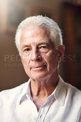 Buy stock photo Portrait of a serious senior man at home