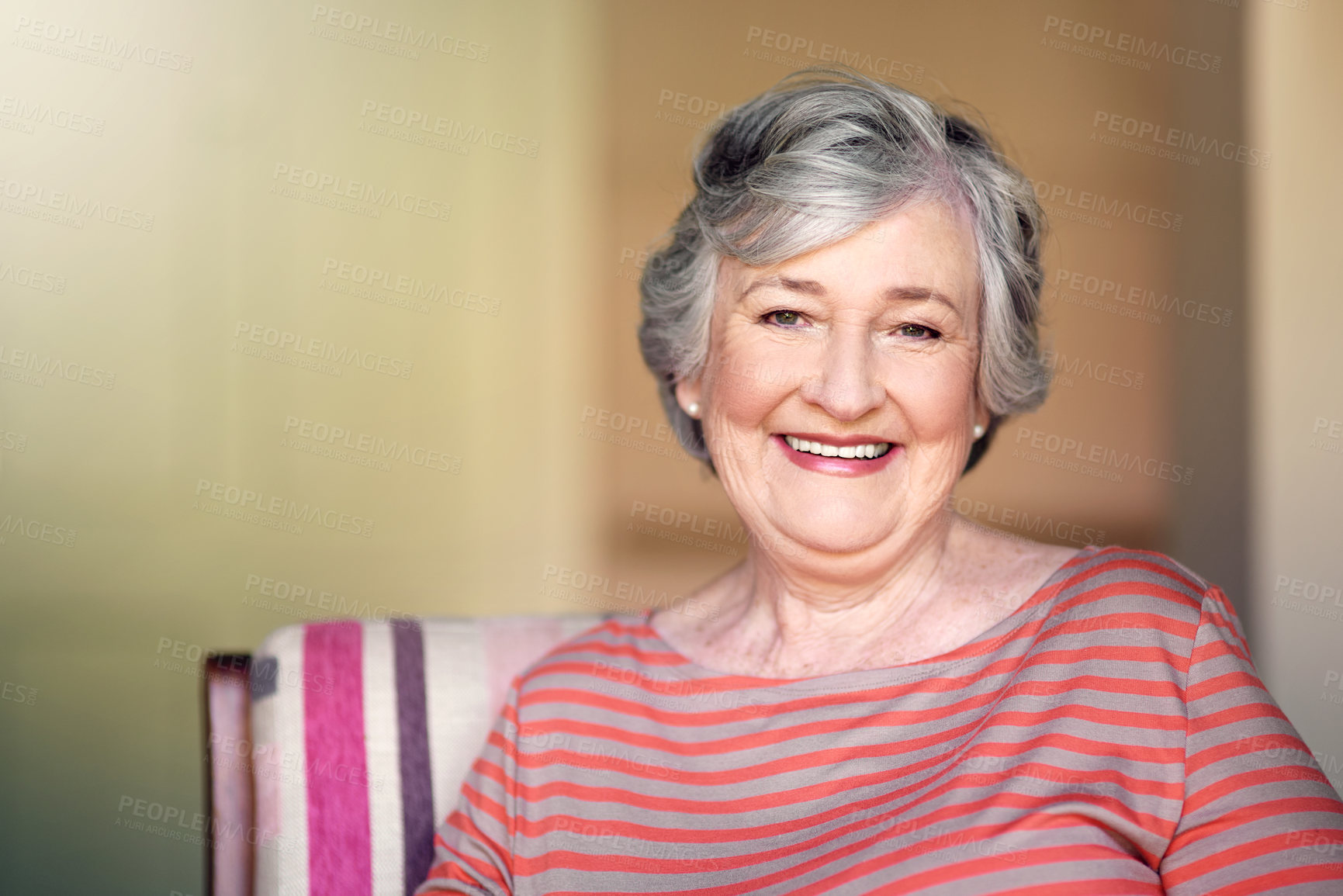 Buy stock photo Home, relax and portrait of a senior woman with a smile for retirement and old people happiness. Happy, relaxing and an elderly lady in a chair in the living room with confidence and comfort