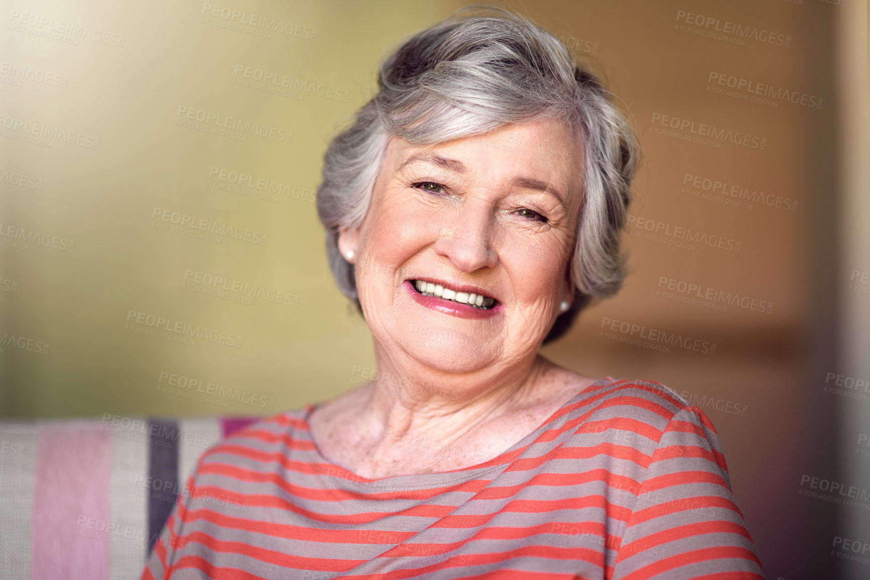 Buy stock photo Portrait, nursing home and happy senior woman in living room, laughing in house or relax in retirement. Elderly lady, happiness and healthy person smile for funny, joke or freedom of retired life