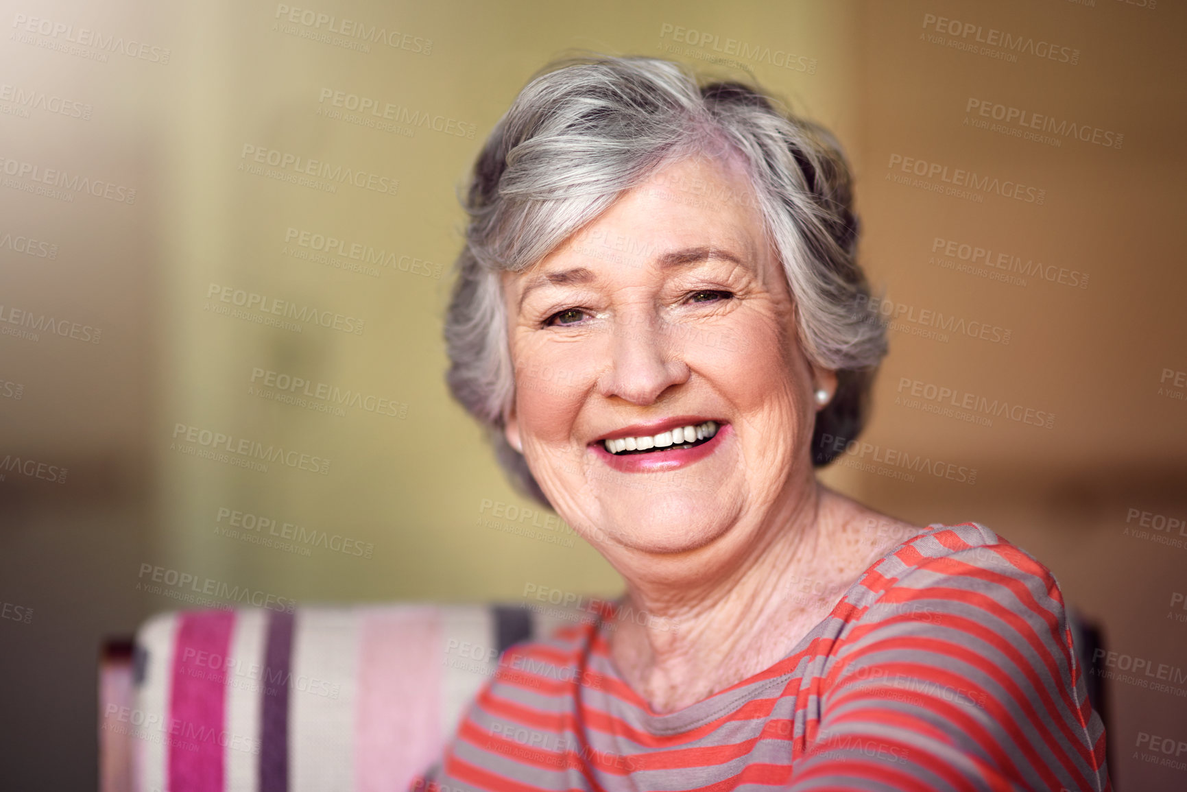 Buy stock photo Portrait, nursing home and happy senior woman in living room, laughing in house or relax in retirement. Elderly lady, happiness and healthy person laughing at funny, joke or freedom of retired life