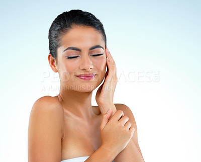 Buy stock photo Woman, cosmetics and makeup with eyes closed in studio with wellness, glow and mockup space by blue background. Girl, model and person with beauty, aesthetic and dermatology for skincare in Mexico