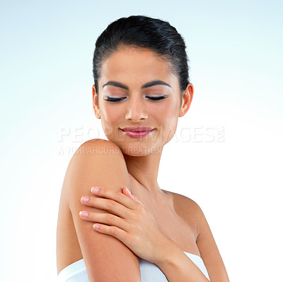 Buy stock photo Body care, salon and woman in studio with natural, moisturizing or hydration treatment. Health, beauty and female person with dermatology routine for soft, smooth and clean skin by blue background