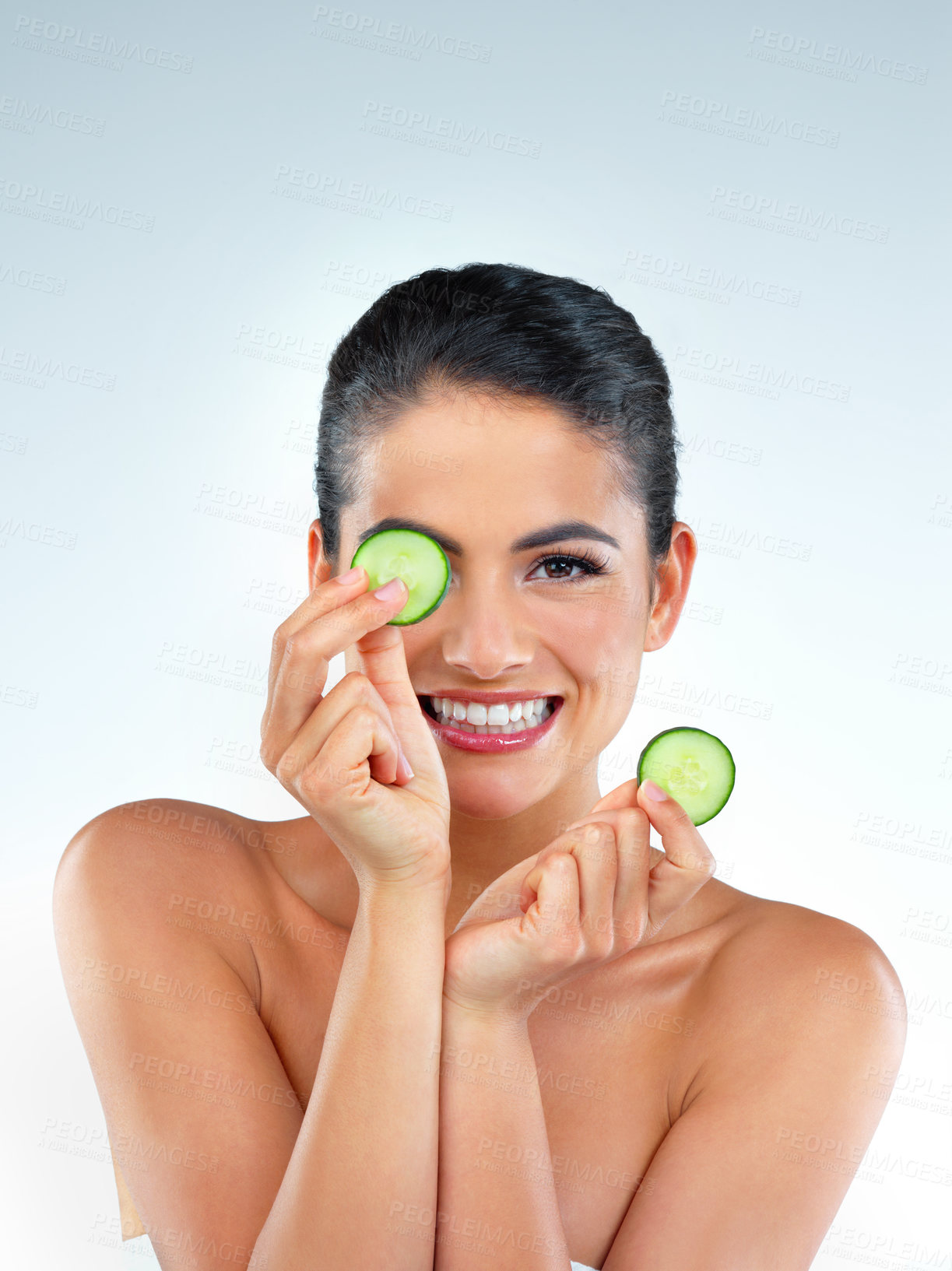 Buy stock photo Cucumber, beauty and portrait of woman in studio with natural, revitalizing or facial routine. Skincare, health and person with vegetable for face dermatology treatment for glow by gray background.