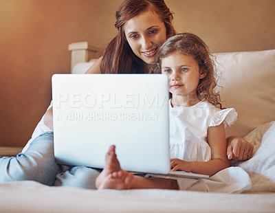 Buy stock photo Mother, child and relax on bed with laptop for streaming subscription, cartoon and online video in home. Happy family, woman and girl in bedroom with technology for social media, bonding and kid film