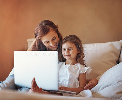 Buy stock photo Mother, child and happy on bed with laptop for streaming subscription, cartoon and online video in home. House, woman and girl relax in bedroom with technology for social media, bonding and kid film