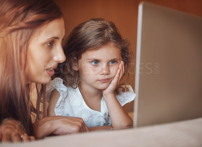 Buy stock photo Mother, girl kid and laptop on bed for streaming subscription, cartoon and online video in home. Happy family, woman and child in bedroom with technology for social media, bonding and watching film