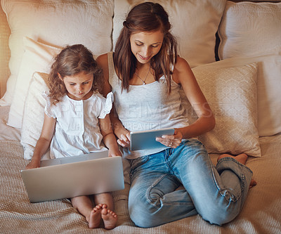 Buy stock photo Mom, girl and technology in home for streaming movies, bonding and top view on bed together. Woman, child and laptop in apartment for tv show, cartoon or social media with relax and subscription