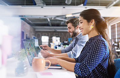 Buy stock photo Coworking, office and woman at desk with laptop, smile and man at creative agency, working on project together. Collaboration, partnership and happy employees or business partner at design startup.