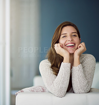 Buy stock photo Portrait, funny and woman relax on sofa in home living room laughing at comedy. Face, excited or happy female person from Canada on couch in lounge, apartment or house to enjoy me time, joke or humor