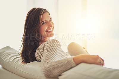 Buy stock photo Portrait, smile and woman relax on sofa in home living room on holiday. Face, happy and young female person from Canada on couch in lounge, apartment or house to enjoy me time, vacation and mockup.