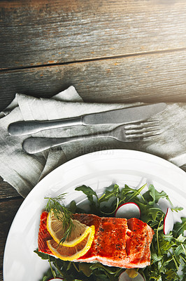 Buy stock photo Plate, fish and salad with lemon, above and food for health, wellness and nutrition with fine dining. Salmon, dinner or restaurant with leaves, vegetables and diet with seafood in pescatarian meal