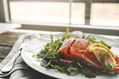 Buy stock photo Plate, fish and lemon in restaurant, food and choice for health, wellness and nutrition with fine dining. Salmon, dinner and closeup with leaves, vegetables and seafood for diet with pescatarian meal