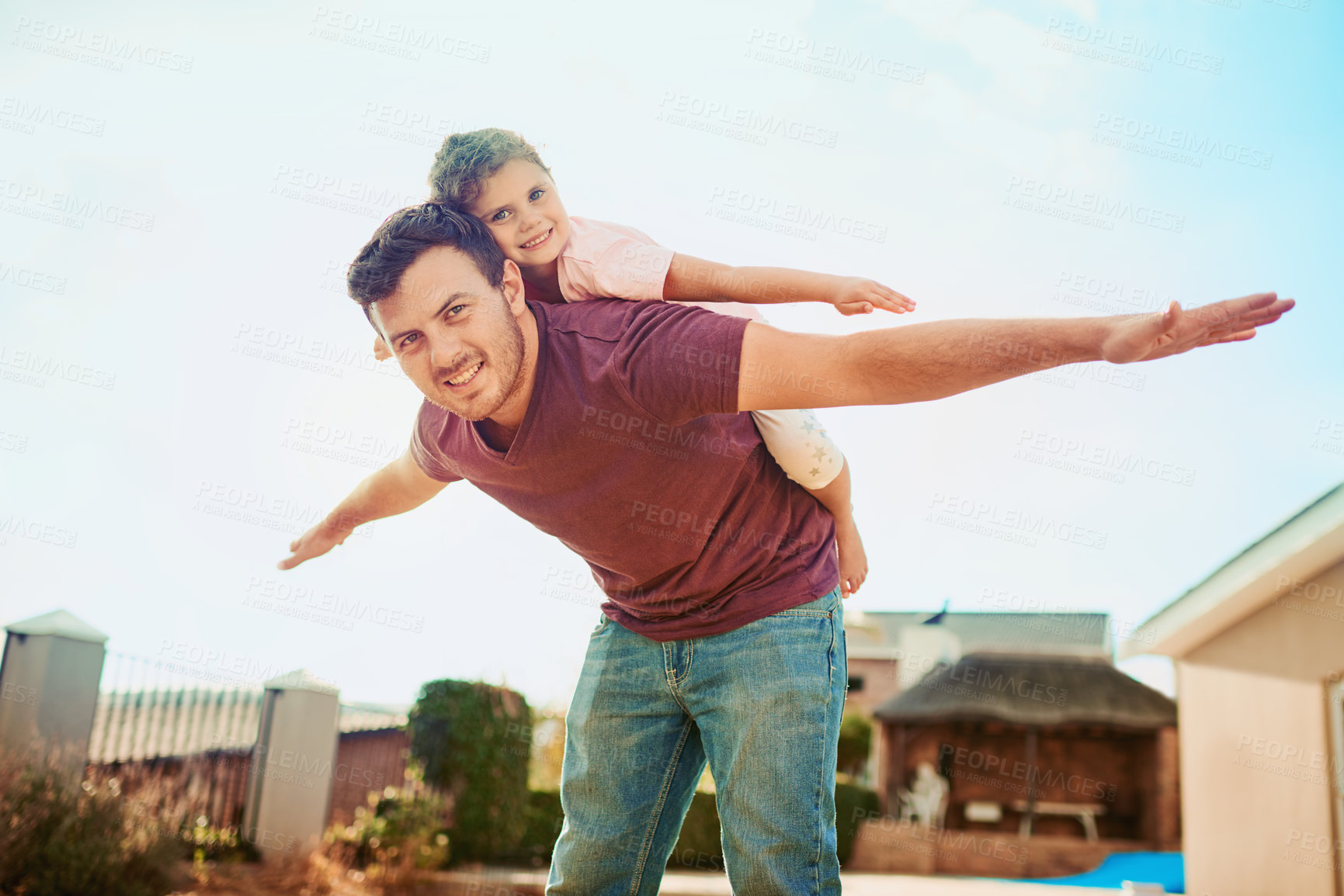 Buy stock photo Piggyback, portrait and child with airplane on man for outdoor adventure, fun and pretending to fly. Happy, father and daughter with game in backyard for family love, weekend and bonding in summer