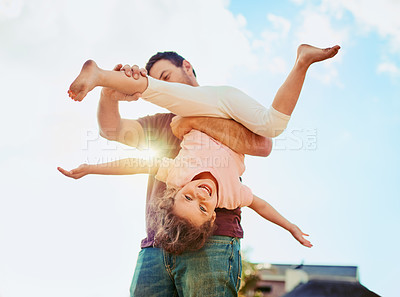 Buy stock photo Sky, dad and child in portrait with play together for happy bonding, growth and development for kids. Smile, father and girl in backyard with support, energy and trust in fun games on weekend morning