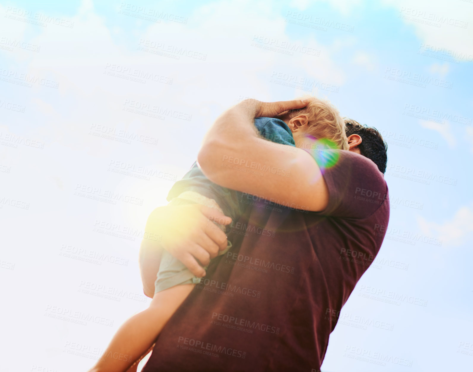 Buy stock photo Sky, hug and dad holding child for bonding, comfort and development for kids in low angle. Care, father and son embrace in nature for outdoor support, love and trust on weekend morning together